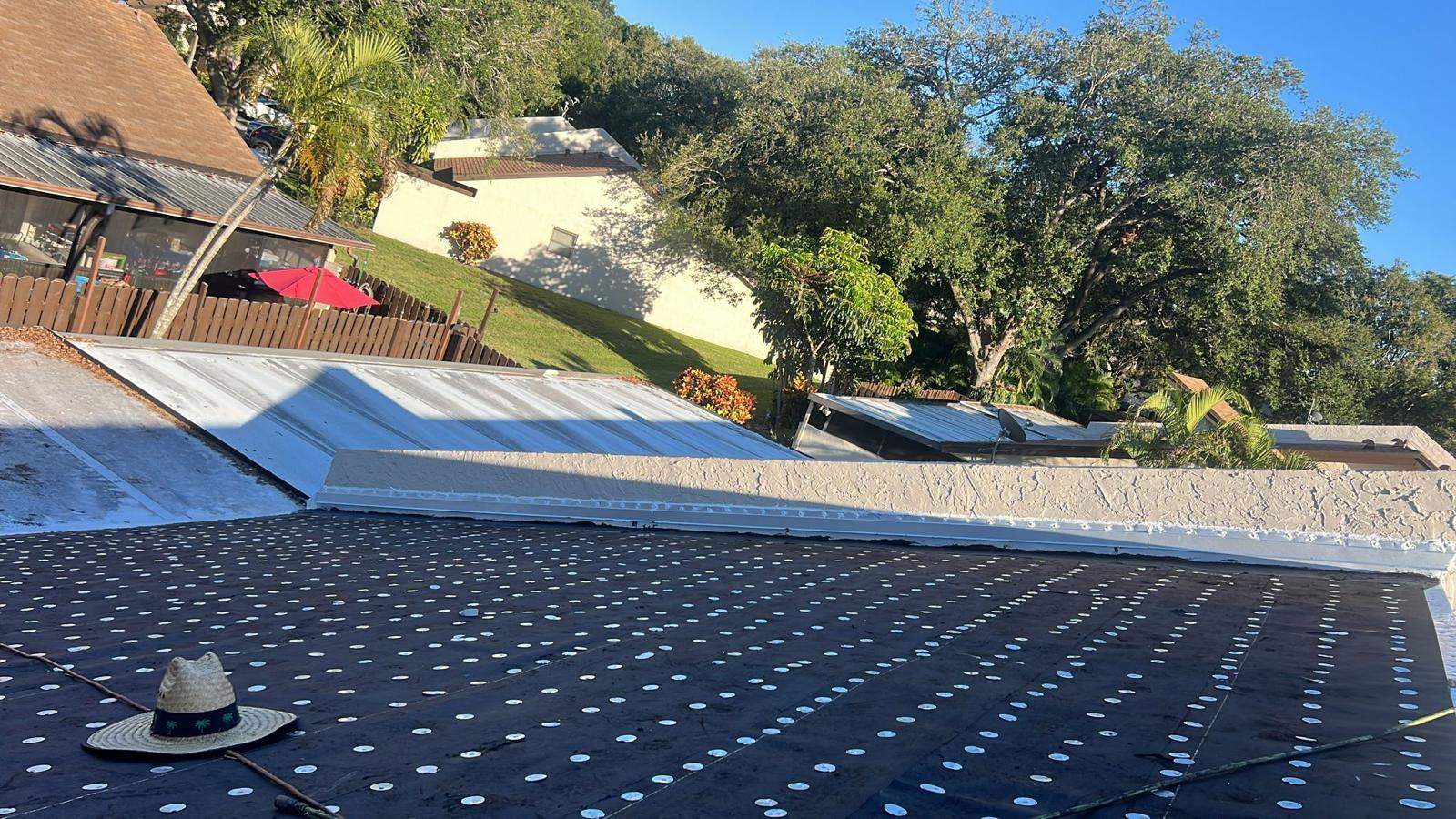 Real Palm Beach Gardens roof project showing underlayment and pipe penetrations