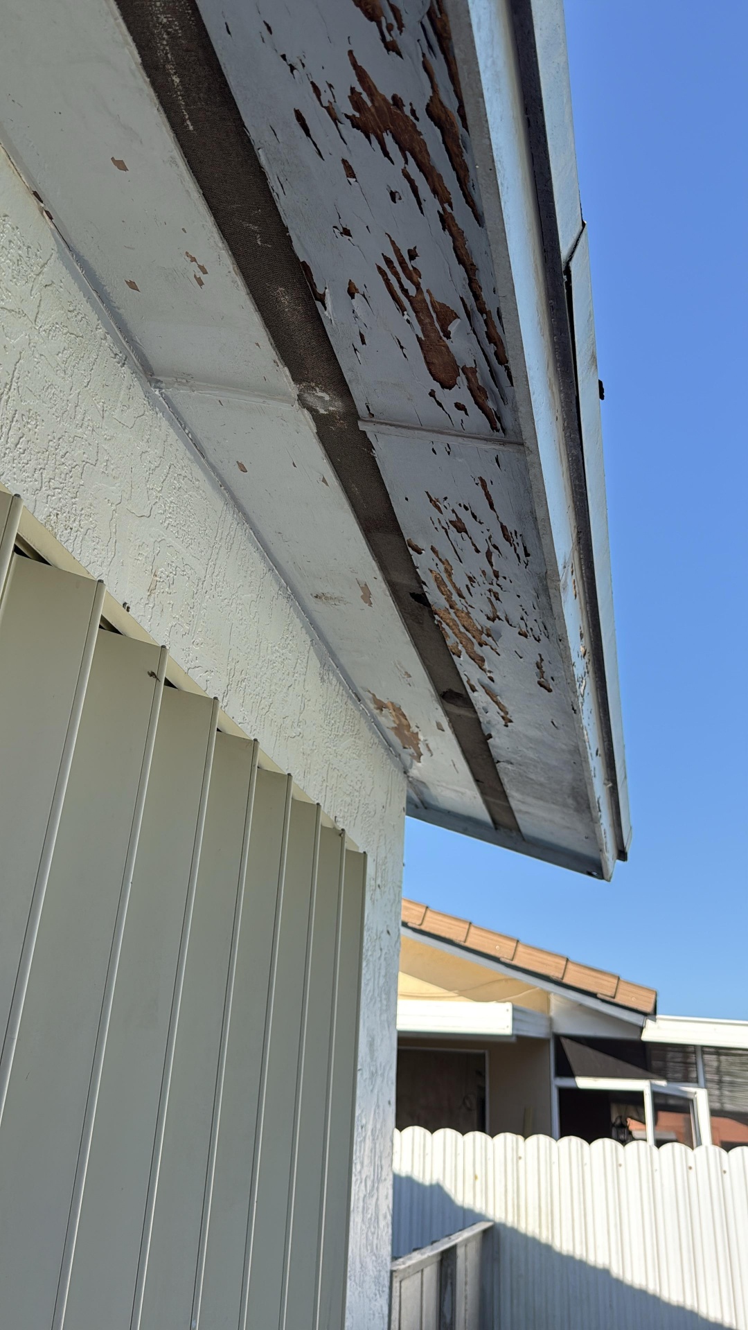 Corroded roof flashing and fascia detail identified during a Palm Beach Gardens roof repair diagnostic